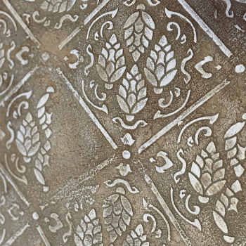 Detailed close-up of intricate pattern on a lime-based painted surface.