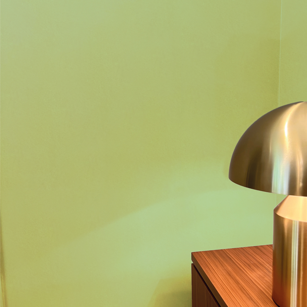 Modern Lamp on Wooden Table with Carrara Semi-Gloss Light Green Wall Finish
