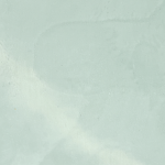 Close-up of a soft mint-colored lime-based painted wall, showcasing subtle texture and a calming, smooth finish.