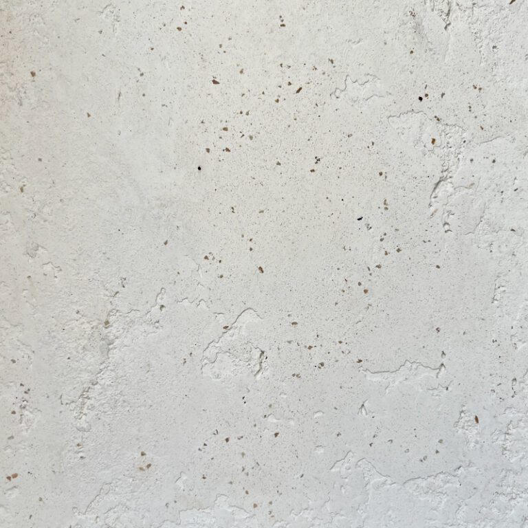 Light Textured White Wall with Small Flecks