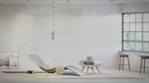 Modern minimalist living room with lounge chair, patterned rug, and a retro-style speaker.