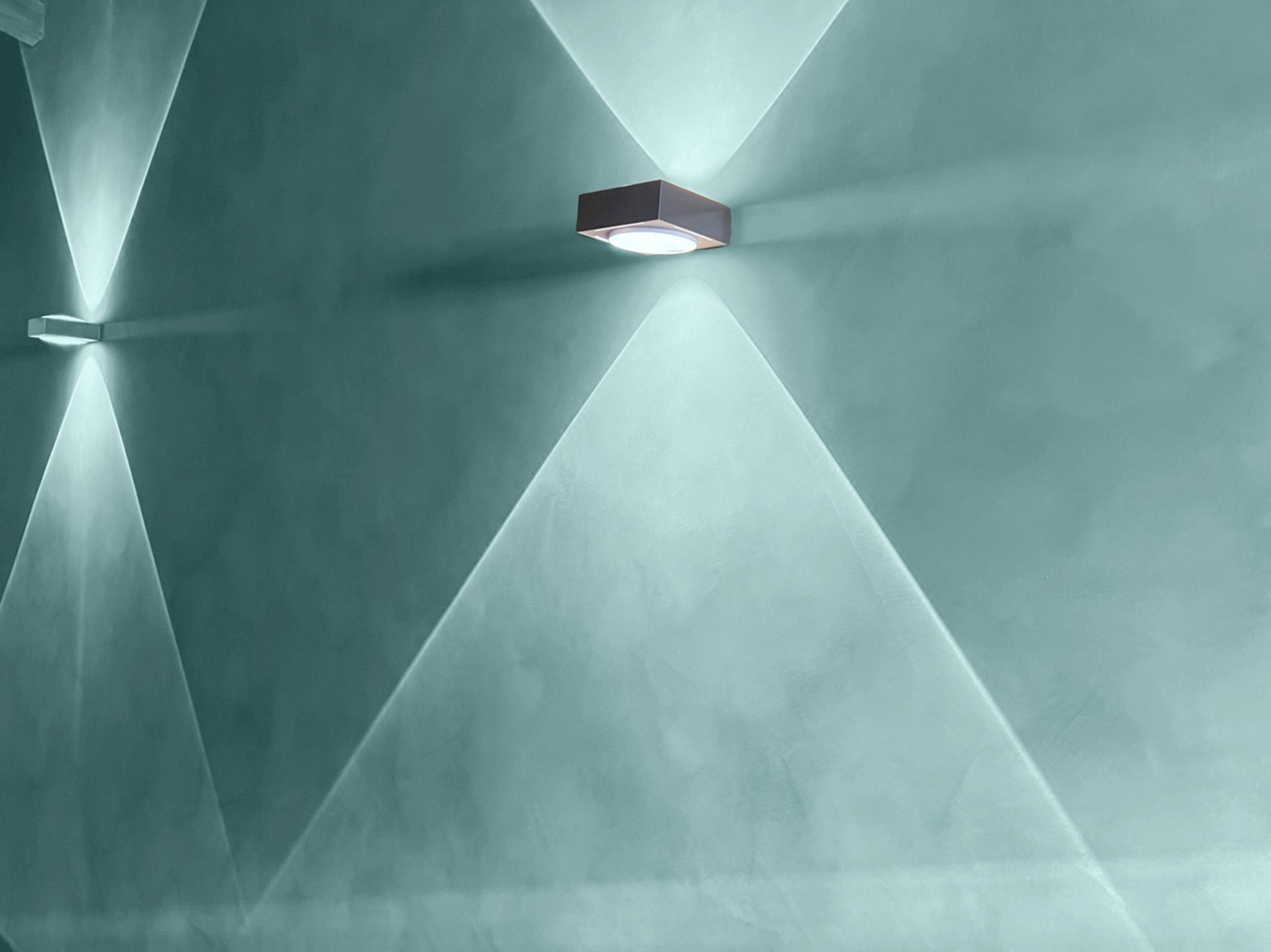 Textured wall with soft lighting creating geometric shapes and shadows