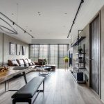 Spacious living area featuring a blend of lime-based finishes and modern furniture, ideal for specialty contractors.