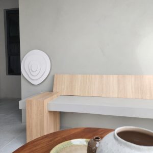 Minimalist bench with seamless microcement finish by Decora Diamond System in a modern Singapore home.