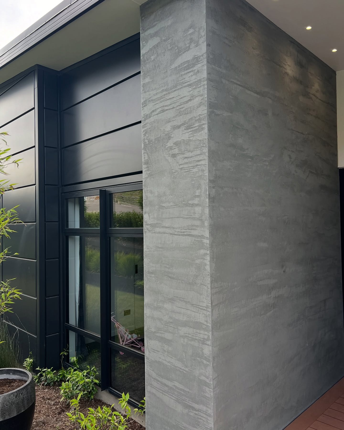 Vertical exterior feature wall in Teseo Travertine stone finish