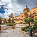 Historic Italian cathedral and plaza under dramatic sky with "Our Journey" text, symbolizing Decora A&C's heritage and mission.