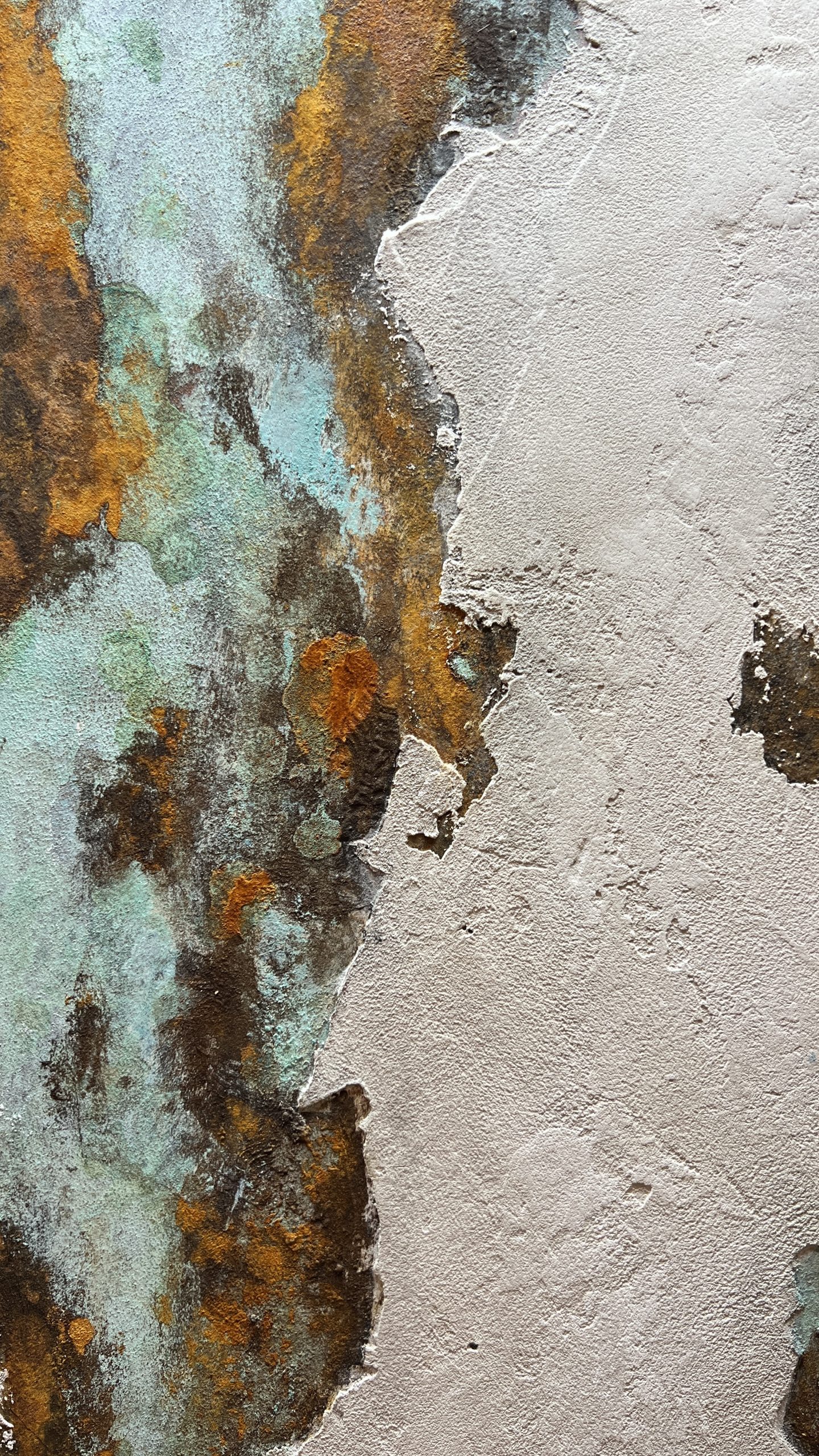 Layered textured surface showing aqua blue, rust orange, white, and metallic gray oxidation effects with Rust.IT.