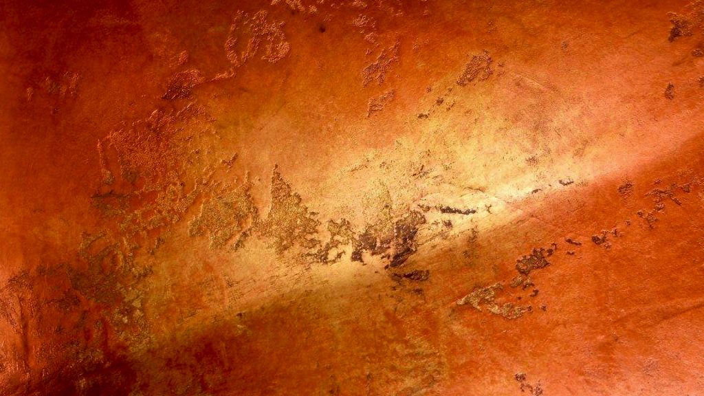 Metallic steel art featuring vibrant copper and rust tones, with intricate texture and Italian-inspired design elements.