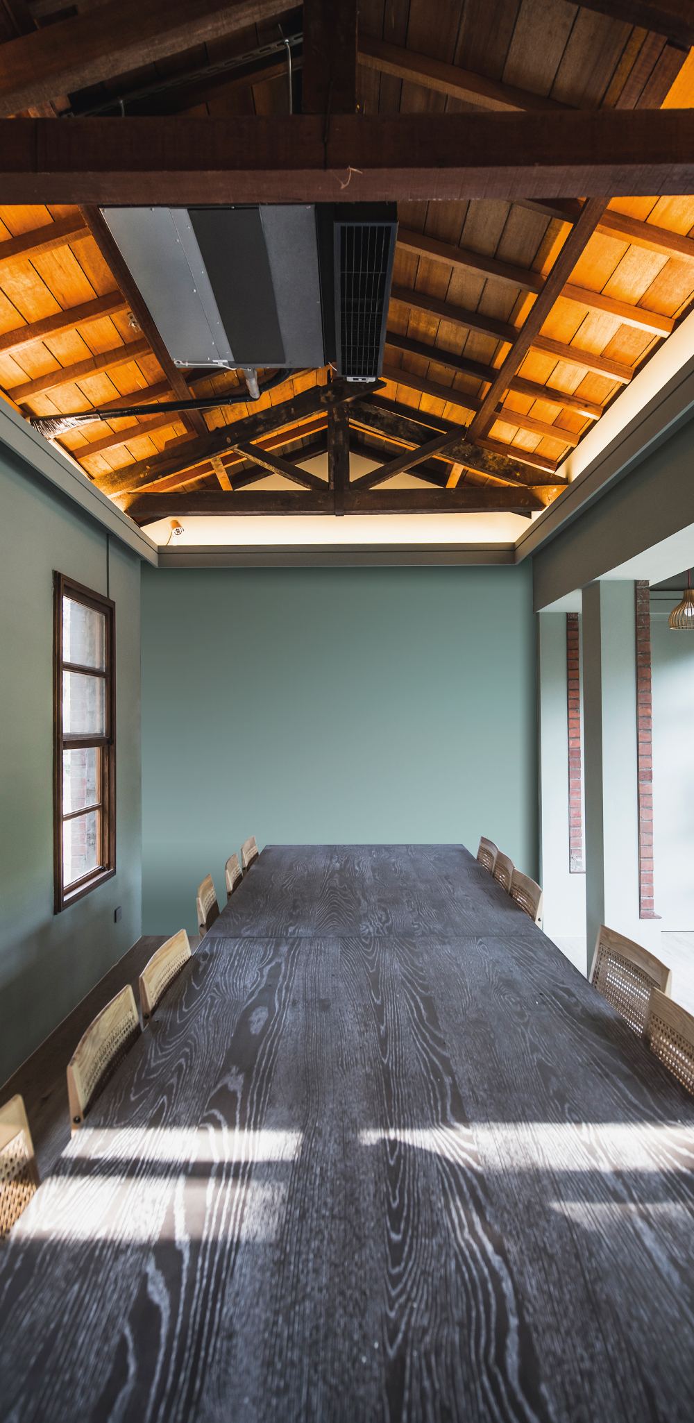 Modern Meeting Room with Wooden Table and Carrara Semi-Gloss Green Wall Finish